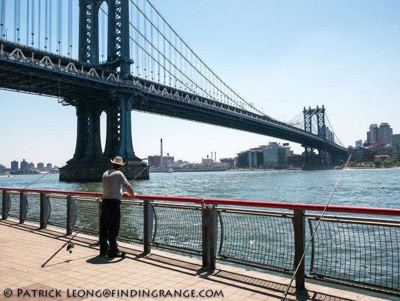 Panasonic-Lumix-GX85-15mm-Summilux-f1.7-ASPH-Manhattan-Bridge-Street-Candid-Fisherman-1